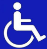 Znak graficzny osoby na wózku inwalidzkim