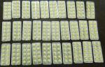 Kilkadziesiąt blistrów z żółtymi tabletkami