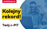 Kobieta i mężczyzna przy komputerze. Napis Kolejny rekord. Twój e-PIT.