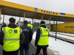 Uczestnicy spotkania na przejściu granicznym w Ukrainie